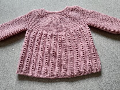 Sideways knit baby jacket