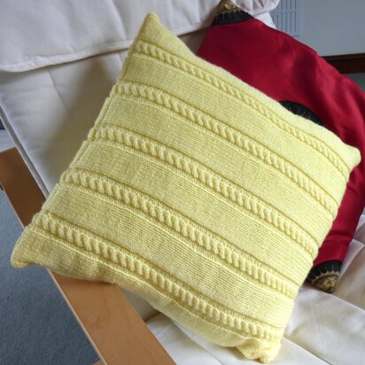 Cabled cushion cover