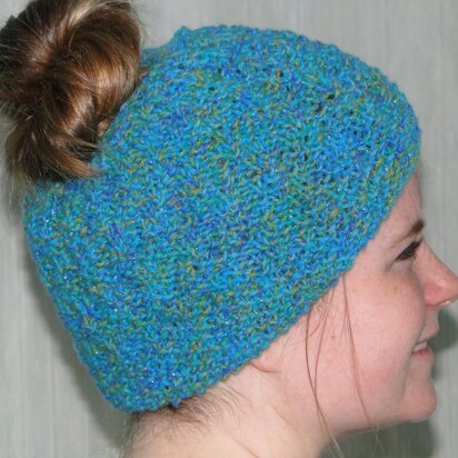 Flo's messy bun hat