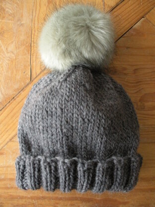 Grey hat with turned rib