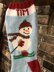 Snowman stocking on skis