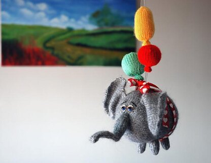 Airy-Fairy Flying elephant with 3 balloons ( knitted round )