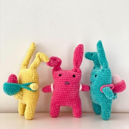 Bunnies with backpack and easter eggs