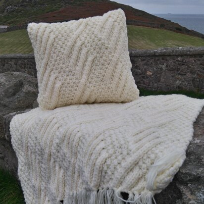 Chunky rug and cushion with diamond moss stitch pattern