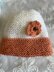 Easy beginner garter stitch flower and pompom baby hat DK knitting pattern