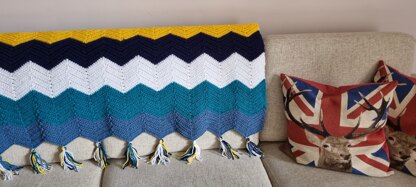 Ripple blanket with tassels