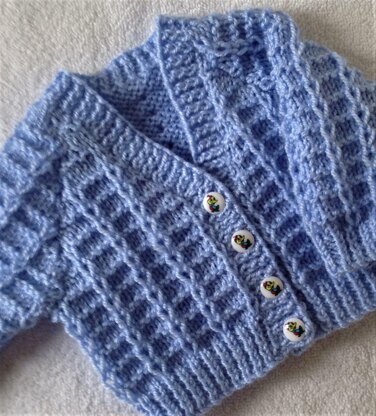 Little Loops baby cardigan Knitting pattern by Seasonknits | LoveCrafts