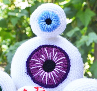 Crochet eyeballs. Creepy eyes. Halloween spooky eyes. Eyeball with blood vessels