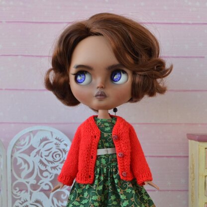 Knitted red cardigan for doll