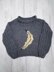 Super chunky jumper with banana motif
