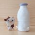 Baby Cow in Giant Milk Bottle