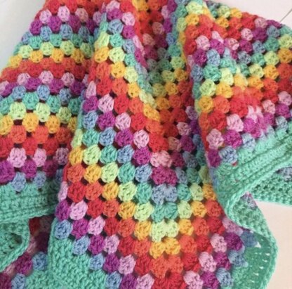 Happy Rainbow Granny Square Blanket