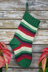 Poinsetiia Stocking in Universal Yarn Deluxe Stripes and Deluxe Worsted Superwash - Downloadable PDF