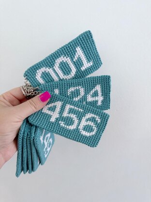 Squid Game inspired player numbers keychain