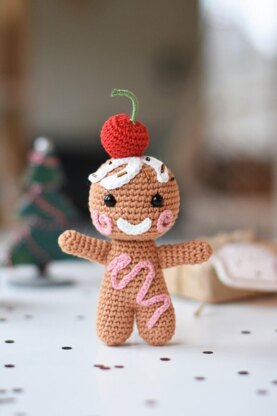 Amigurumi gingerbread with a cherry on top