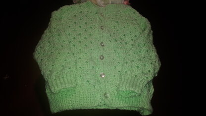 Green baby cardigan for Shoba's grandchild