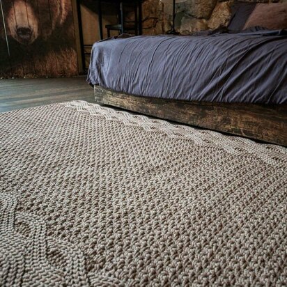 Wide rug with double braid