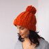 Knit look bulky hat with pom pom