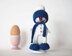 Lovely and sweet Snowman in the blue hat and scarf for keeping warm breakfast egg