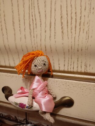 Tiny amigurumi doll