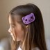 A crochet kitty hair clip