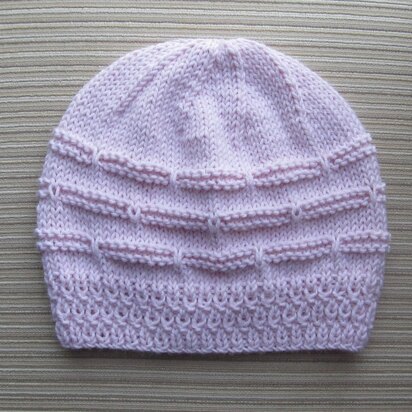 Pink Hat with Garter Stripes and Slipped Stitches for a Lady