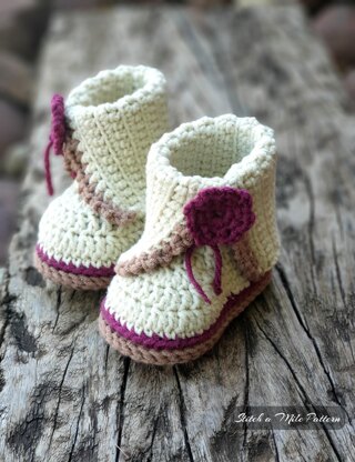 Baby bootie with split cuff and flower detail