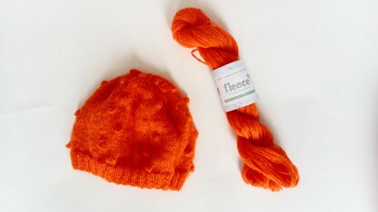 Pure wool orange hat with bobbles