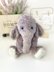 Cute stuffed elephant in a hat