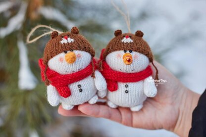 Knitted snowman in Teddy bear hat.