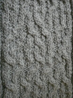 Tangled up cable knit scarf