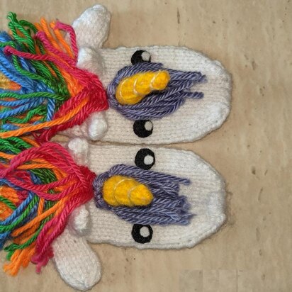 Knit rainbow unicorn mittens