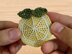 A crochet lemon hair clip