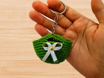 A crochet bag keychain