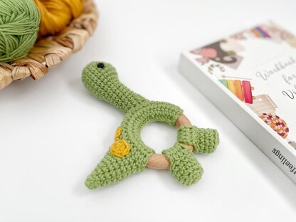 Crochet dinosaur Brontosaurus toy and baby teething rattle amigurumi pattern