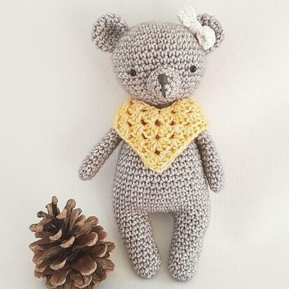 Bear with poncho and bow