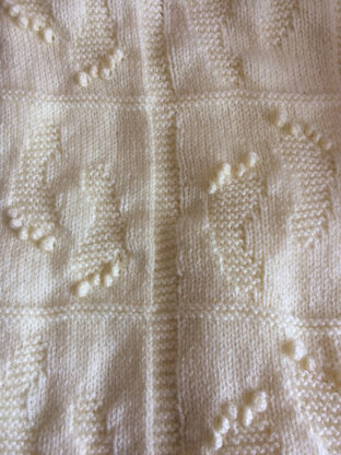 Cream footprints blanket