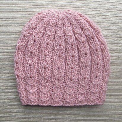 Hat with Eyelet Braids for a Lady - knitting pattern