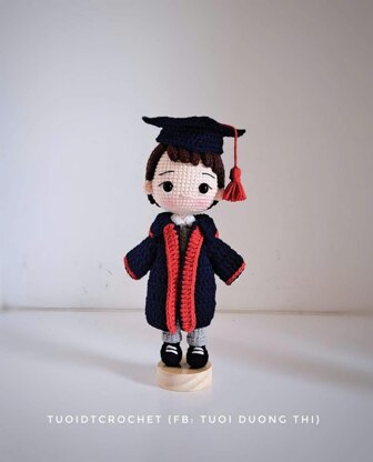 Graduation boy doll