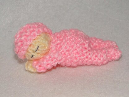 Lovely sleeping baby knitting pattern