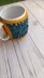 Pillars 'n' Spikes Mug Cozy