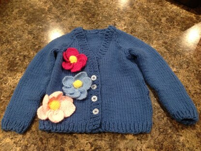 Baby knit cardigan with added flowers