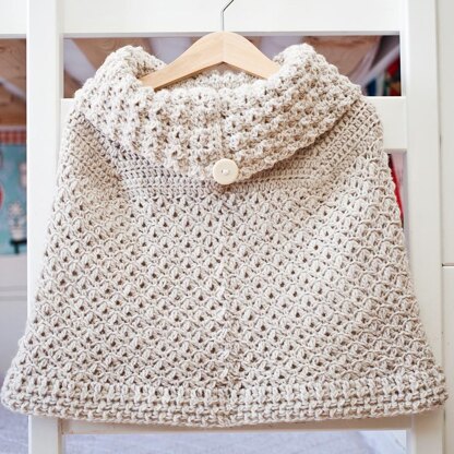 Poncho with oversized collar