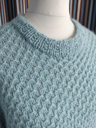 Instructions for Knitting a Blue Jumper with Mesh Pattern