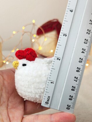 Mini plush chicken in basket