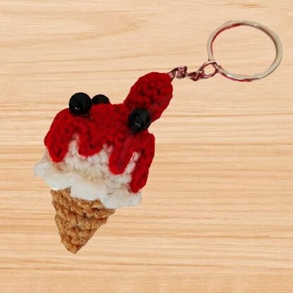 A crochet ice cream keychain