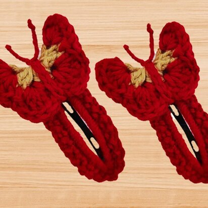 A crochet butterfly hair clip