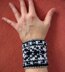 Scorpion tattoo ( wristlet in double knitting)