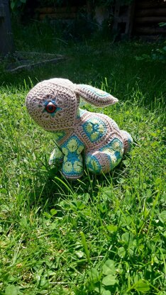 A little Bunny with African Flowers