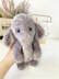 Cute stuffed elephant in a hat